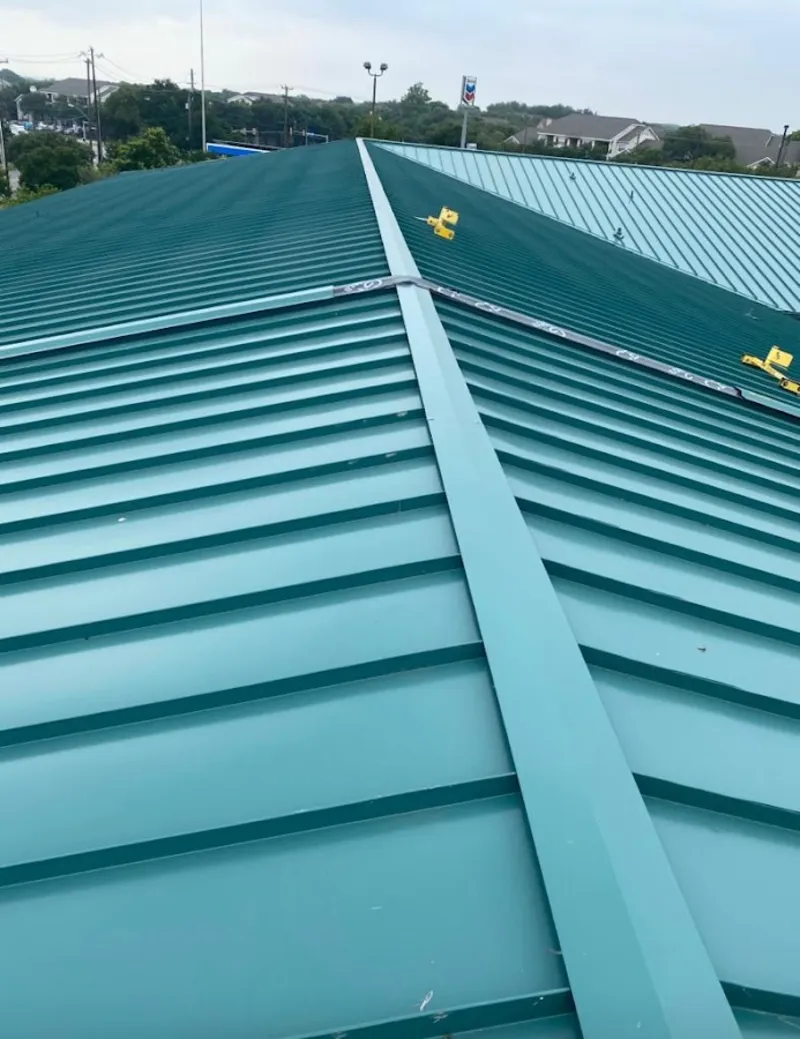 Green commercial metal roof ridge and valley for Metal Roof Repair in French Valley